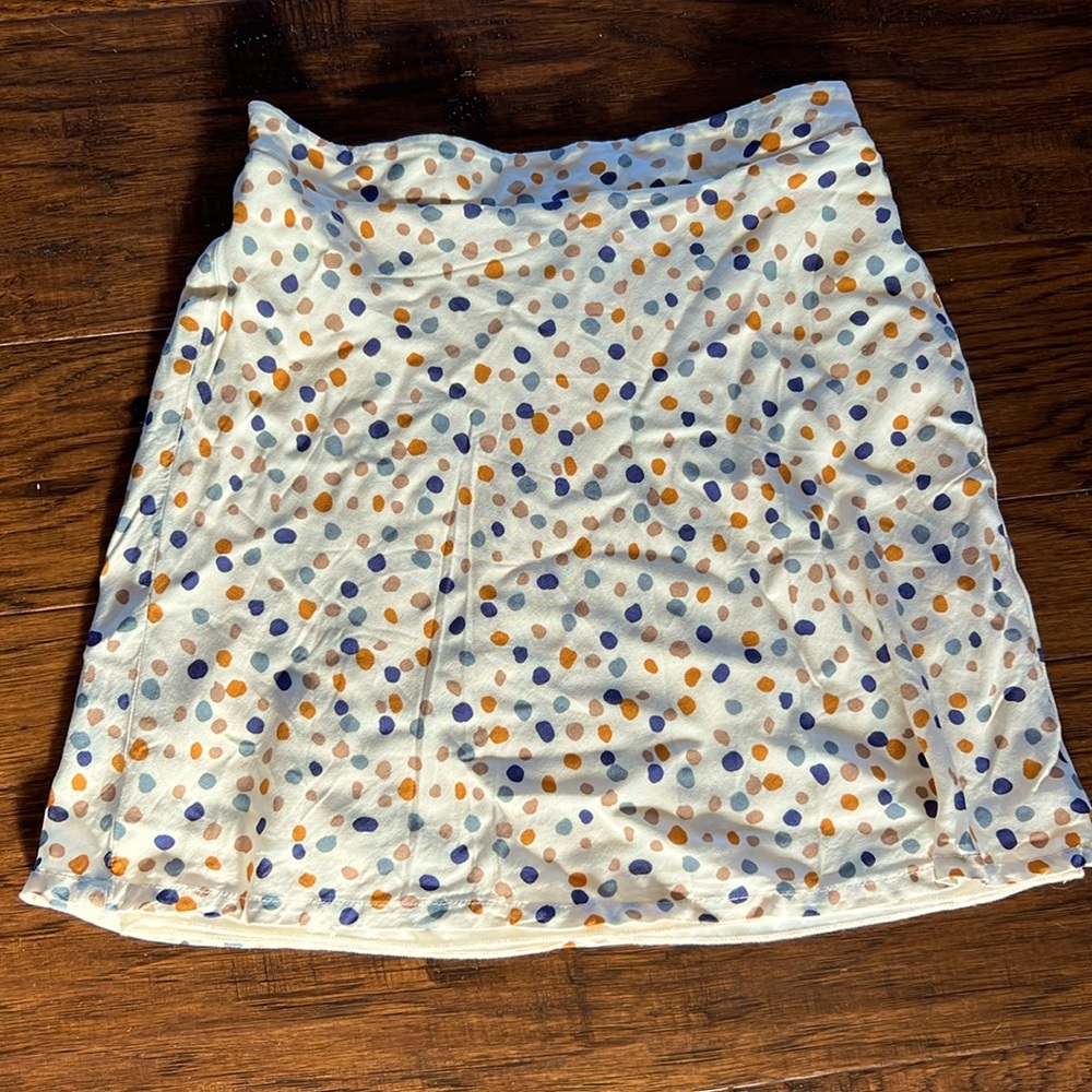 Skirt on creamed background.